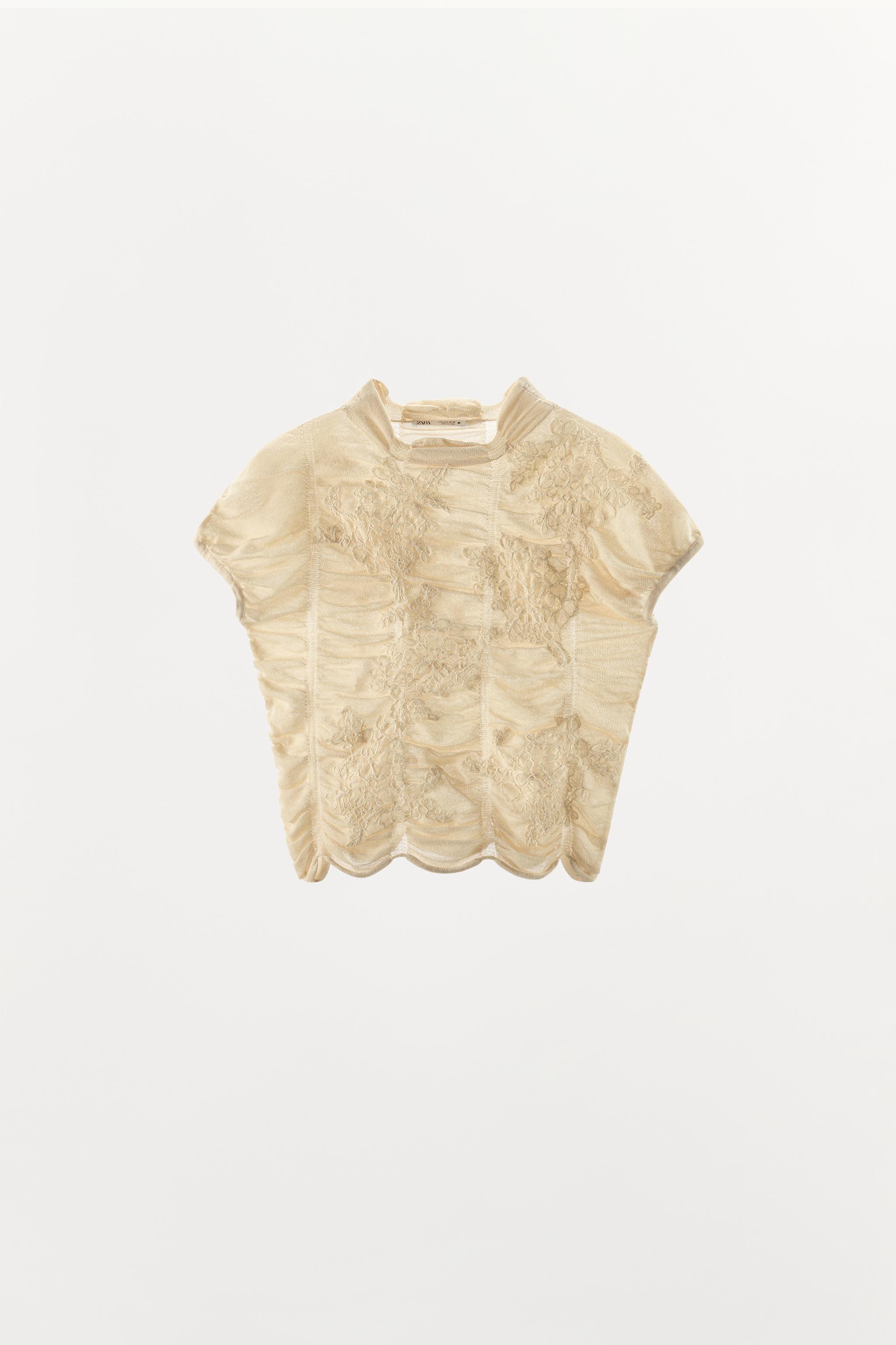 EMBROIDERED RUCHED KNIT TOP